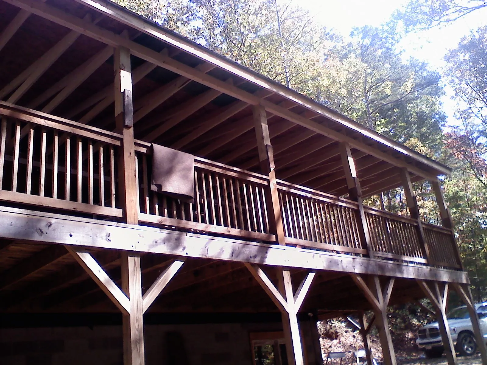 Timber framing under a new elevated porch and deck — Roof Leak Repair in Elyria by Roofing Brothers